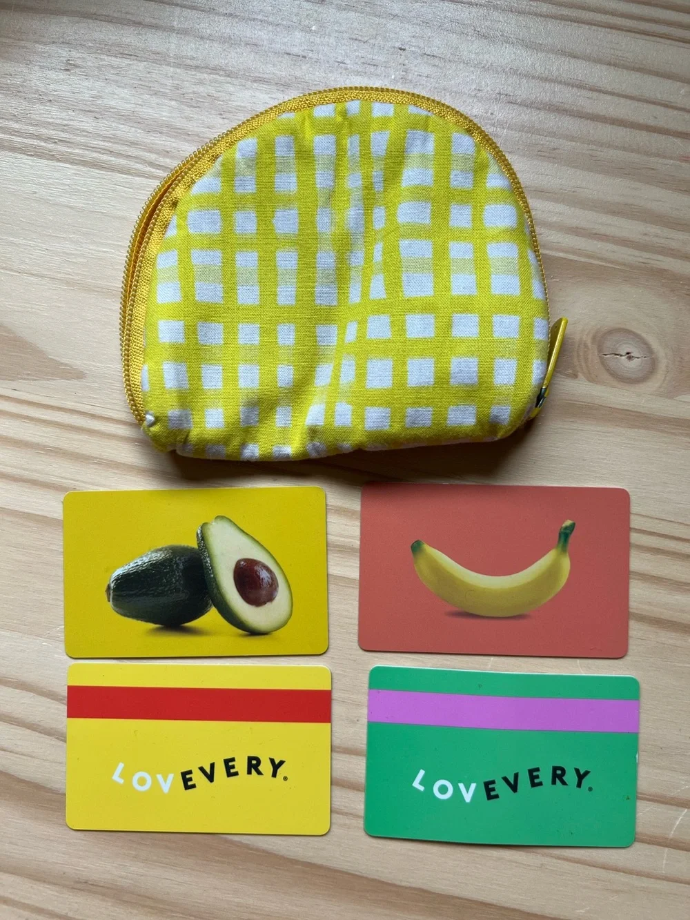 Lovevery yellow checkered coin purse